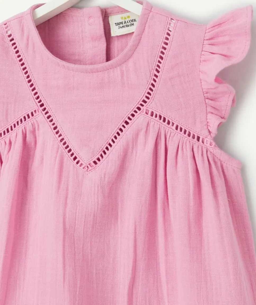 Blouse bébé fille en gaze de coton rose avec volants
