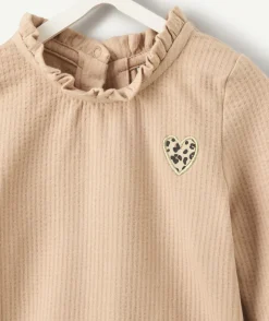 Body bébé fille beige col volanté