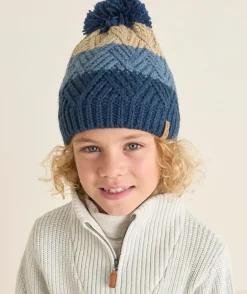 Bonnet en tricot garçon en fibres recyclées bleu, bleu marine et beige avec pompon