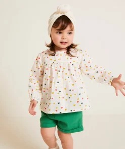 Chemise manches longues bébé fille en coton bio écru imprimé à cœurs colorés
