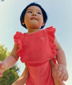Combishort bébé fille rose à volants éponge