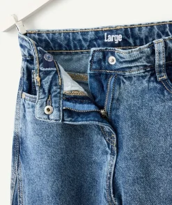 Jean fille large denim avec ceinture rose coeur