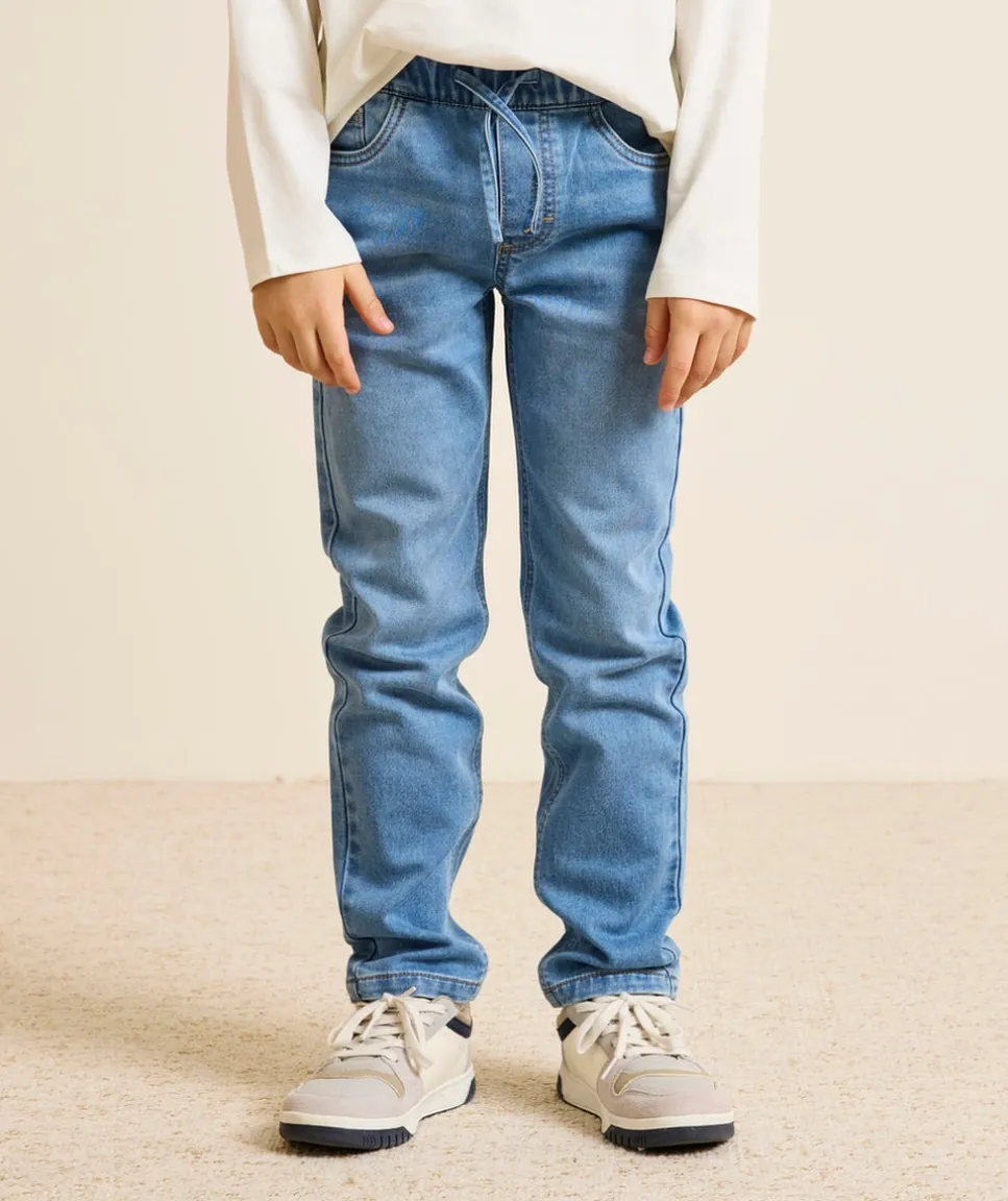 Jean garçon slim bleu avec cordon