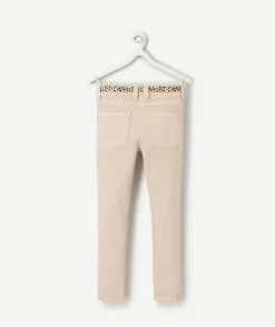 Jean skinny fille beige ceinture léopard