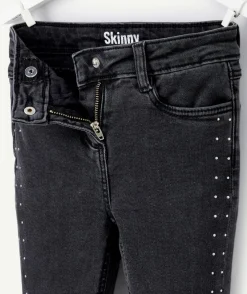 Jean skinny fille denim noir avec clous