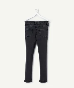 Jean skinny fille denim noir avec clous