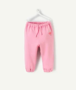 Jogging bébé fille en fibres recyclées rose avec motif mini pousse