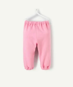 Jogging bébé fille en fibres recyclées rose avec motif mini pousse