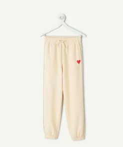 Jogging fille crème imprimé cœur