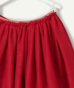 Jupe bébé fille en tulle rouge avec liserés couleur dorée