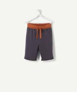 Le pantalon jogging bleu marine et terracotta en coton pima