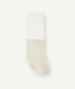Les collants bébé fille blanc et couleur dorée
