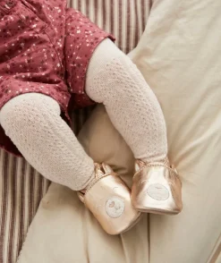 Les collants bébé fille en tricot écru