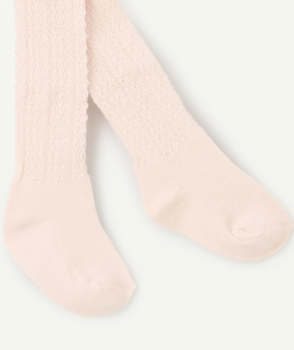 Les collants bébé fille en tricot rose pâle