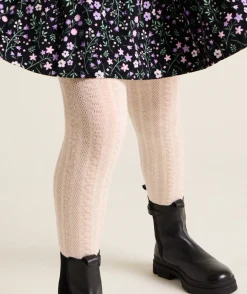 Les collants écrus avec torsades
