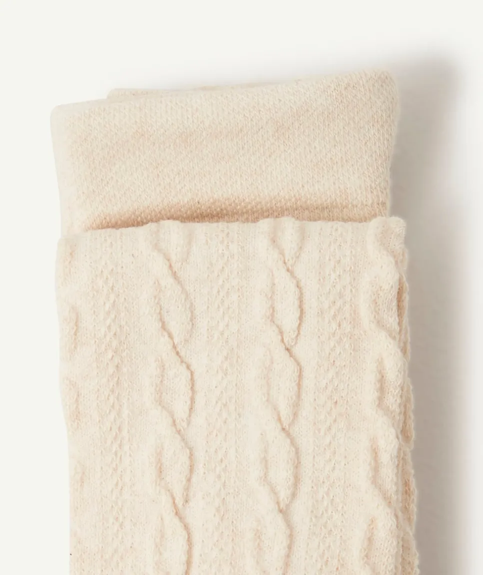 Les collants écrus avec torsades