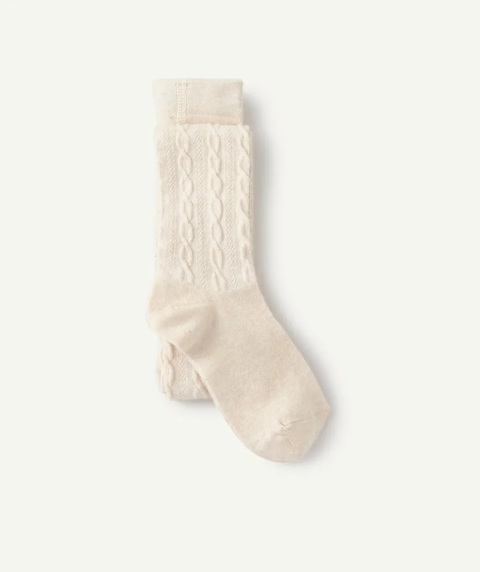 Les collants écrus avec torsades