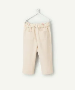 Pantalon bébé fille rose clair avec ceinture fleurie