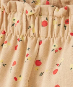 Pantalon droit bébé fille en coton bio beige imprimé légumes