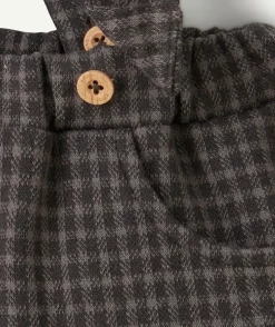 Pantalon sarouel bébé garçon à bretelles et carreaux