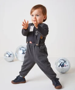 Pantalon sarouel bébé garçon à bretelles et carreaux