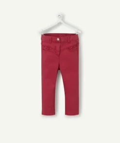 Pantalon slim bébé fille en denim rouge avec volants