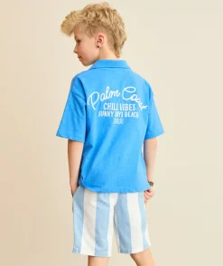 Polo garçon bleu imprimé texte
