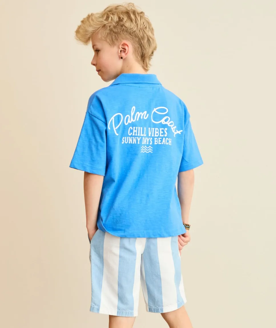 Polo garçon bleu imprimé texte