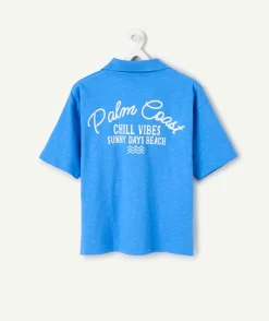 Polo garçon bleu imprimé texte