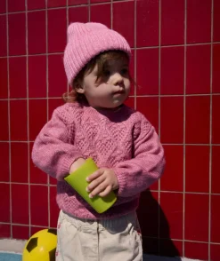 Pull bébé fille rose maille ajourée