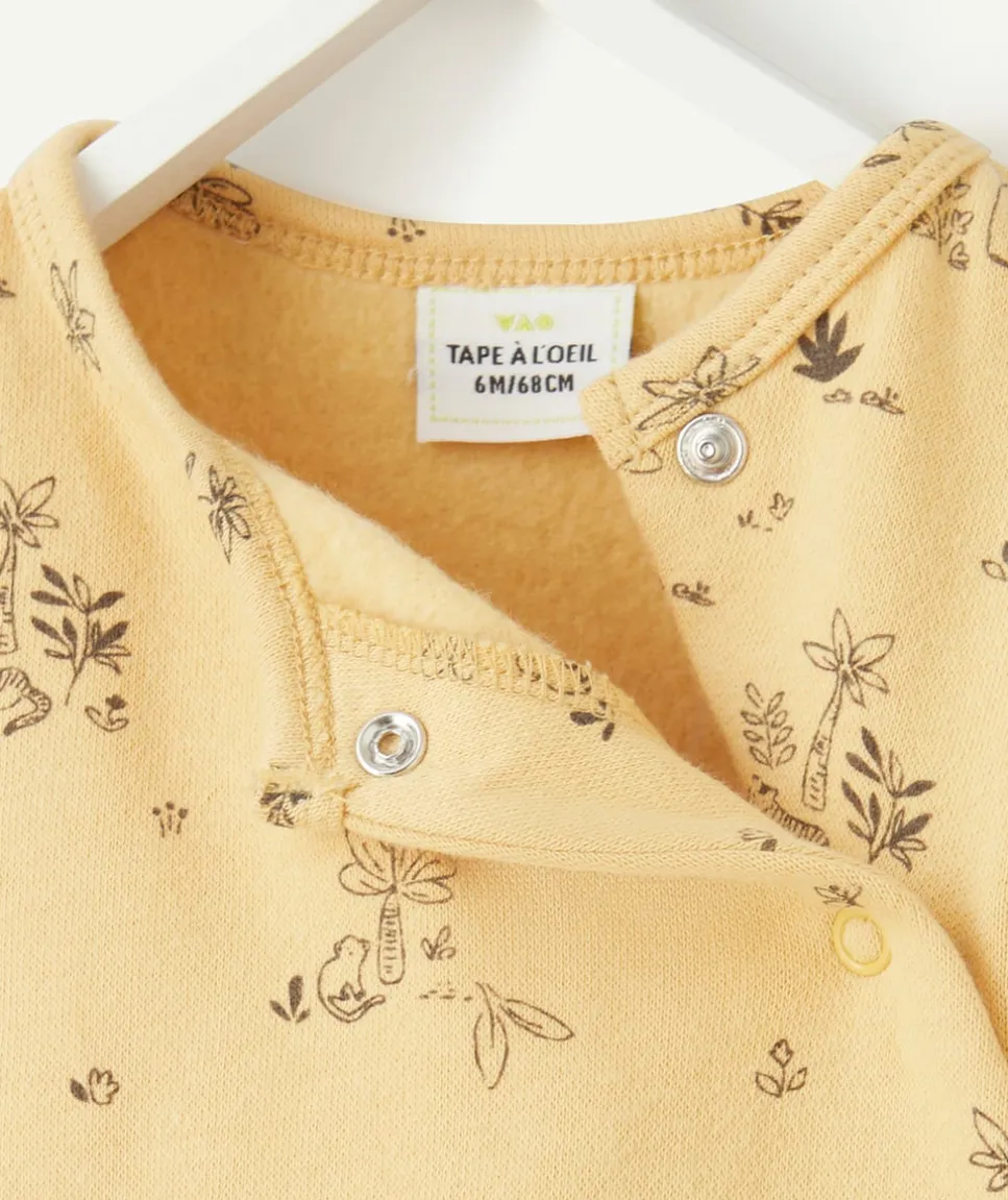 Pyjama bébé en coton bio jaune imprimé savane noir