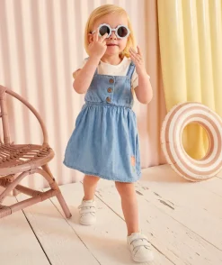 Robe bébé fille en denim léger et lower impact bleu avec broderie fleur