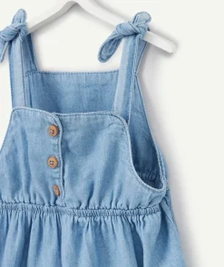Robe bébé fille en denim léger et lower impact bleu avec broderie fleur