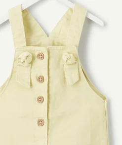 Salopette bébé fille en coton jaune boutons