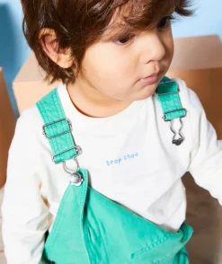 Salopette bébé garçon en fibres recyclées verte avec patch messages
