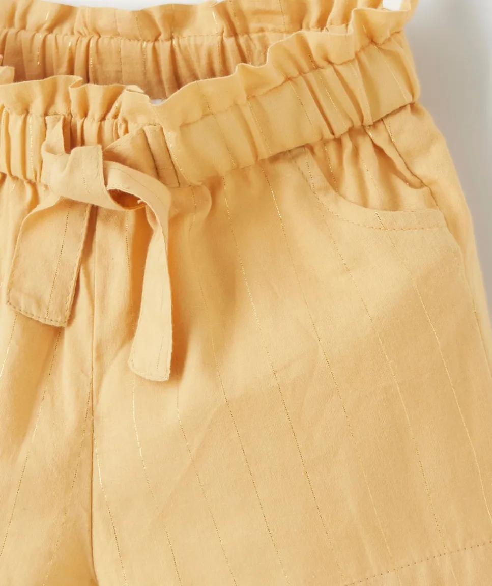 Short bébé fille jaune avec liserés couleur dorée