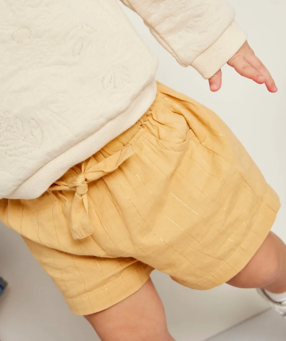 Short bébé fille jaune avec liserés couleur dorée