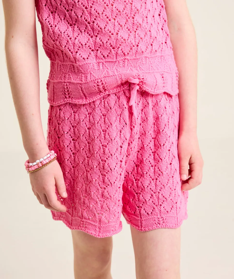 Short fille en maille ajourée rose