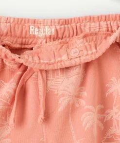 Short garçon orange imprimé palmier taille élastique