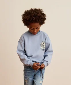 Sweat garçon bleu imprimé skateur