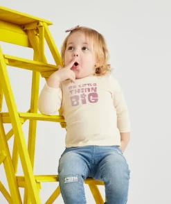 T-shirt beige bébé fille avec message violet