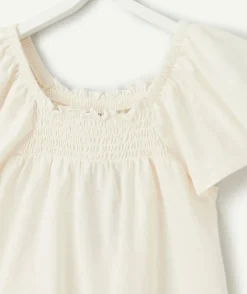 T-shirt fille en coton biologique écru avec col bardot et volants