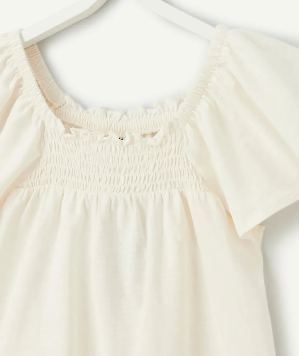 T-shirt fille en coton biologique écru avec col bardot et volants