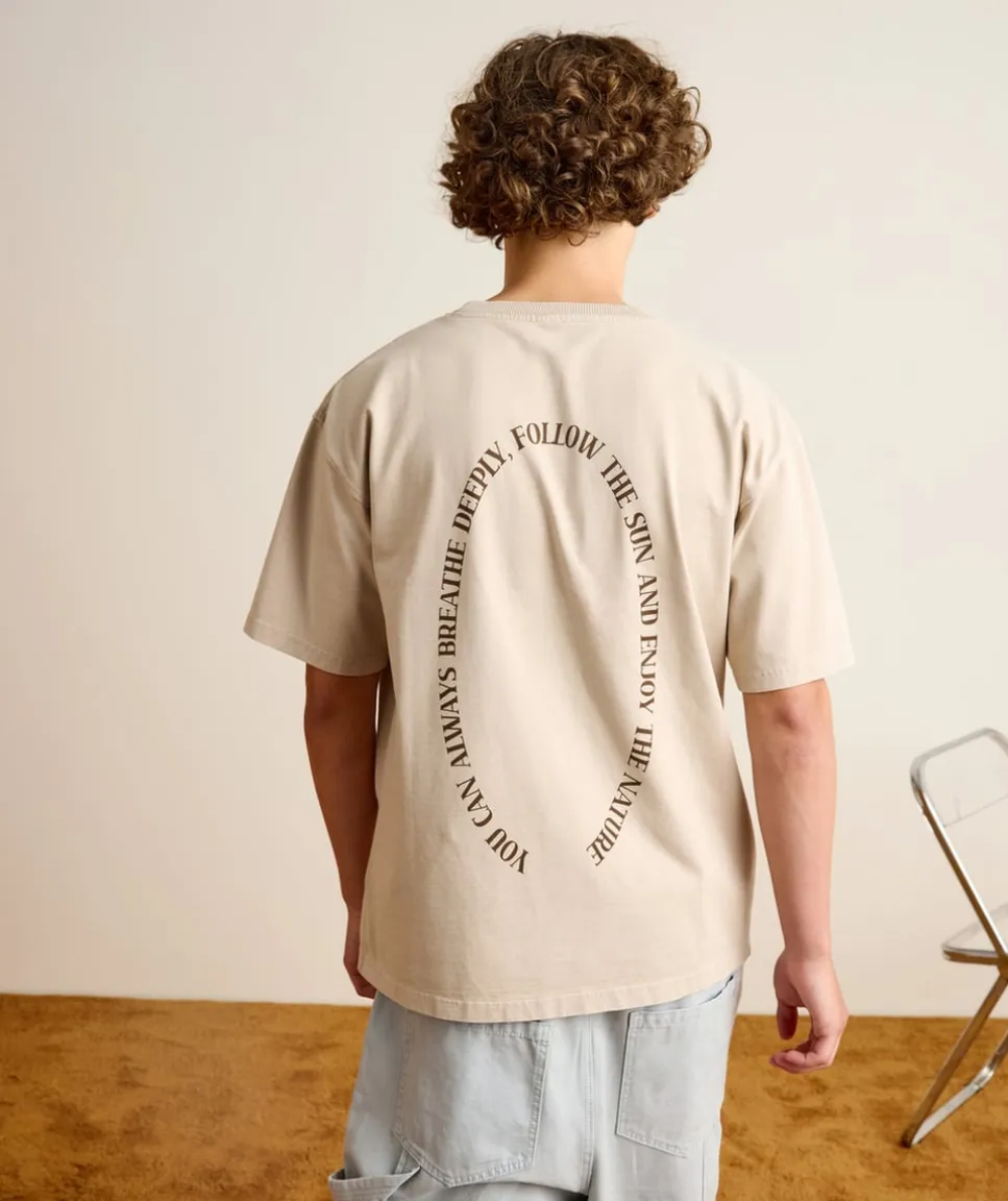 T-shirt garçon oversize beige imprimé
