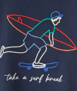 T-shirt manches courtes garçon en coton bio avec broderies surfeur